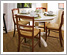 Aris pedestal dining table & bassano chairs